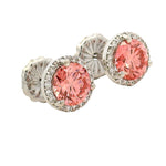 Round pink center diamond stud earrings with white gold halo setting.