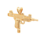 Small 14K gold pendant shaped like a detailed Uzi submachine gun with a hanging loop.
