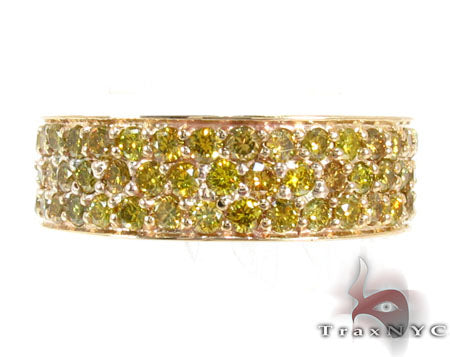 Three-row yellow gold ring with vibrant canary yellow diamonds in pavé setting