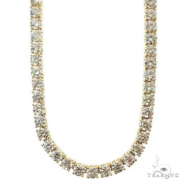 Yellow gold 30-pointer lab diamond tennis chain necklace with round-cut stones.