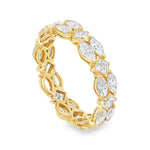 Yellow gold diamond cluster ring with alternating round and square stones in a band style.