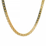 22-inch yellow gold tennis chain with upside down 75 pointer diamonds.