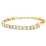 Yellow gold tennis bracelet with alternating upside-down round diamonds in secure clasp.