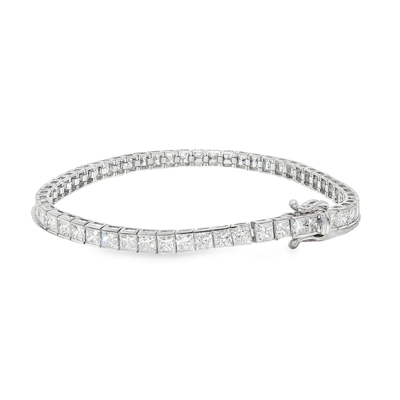 White gold diamond tennis bracelet with secure clasp, sleek and elegant design.
