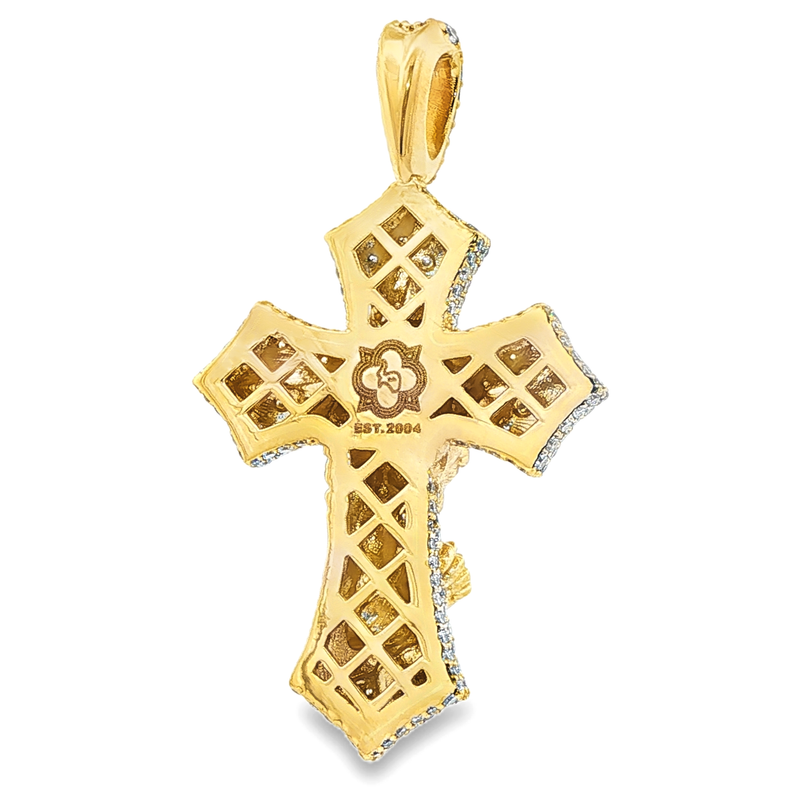 Gold cross pendant with lattice design and diamond accents on edges.