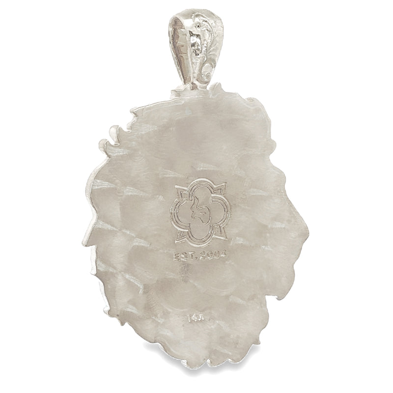 Intricately detailed silver lion head pendant with flowing mane, elegant and masculine design.