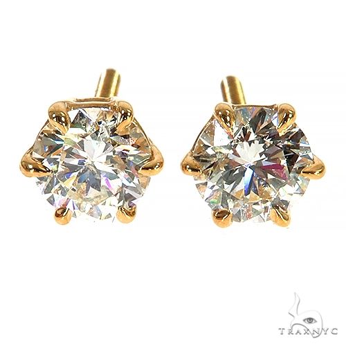 Yellow gold prong-set round diamond stud earrings with six-prong design, unisex style