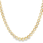 Yellow gold tennis chain necklace with round sparkling diamonds in a classic setting.