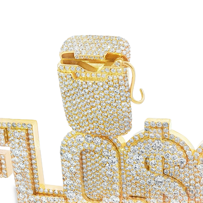 Gold and diamond-encrusted custom pendant with "FLOSS" lettering and dollar sign design.