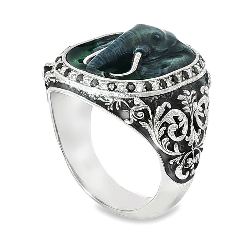 Silver elephant ring with black and white diamond accents and detailed enamel design.