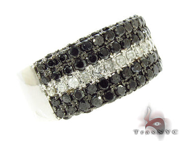 Men's ring with black diamond rows surrounding a center row of white diamonds