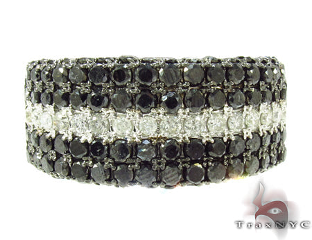 Five-row ring with black diamonds surrounding a central row of white diamonds in white metal