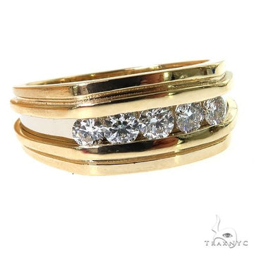 Two-tone gold ring with five round diamonds in a modern, curved design.