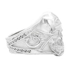 Silver skull ring with all-seeing eye pyramid and geometric details, matte finish.
