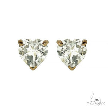 Heart shape white topaz earrings in 14k yellow gold — front view showing faceted stone and gold setting