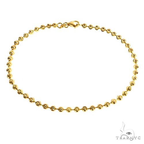 Moon cut 10K yellow gold bracelet, 3mm width, 8 inches, showing ridged faceted link texture
