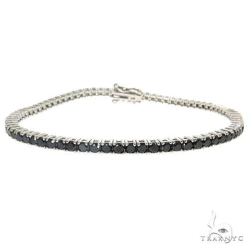 Black diamond bracelet in 14k yellow gold – front view showing diamond settings and metal contrast
