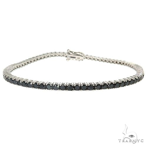 Black diamond bracelet in 14k yellow gold – front view showing diamond settings and metal contrast