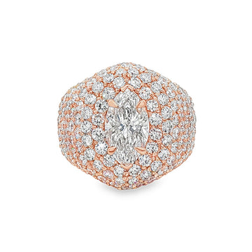 14K gold ring featuring marquise-cut center diamond