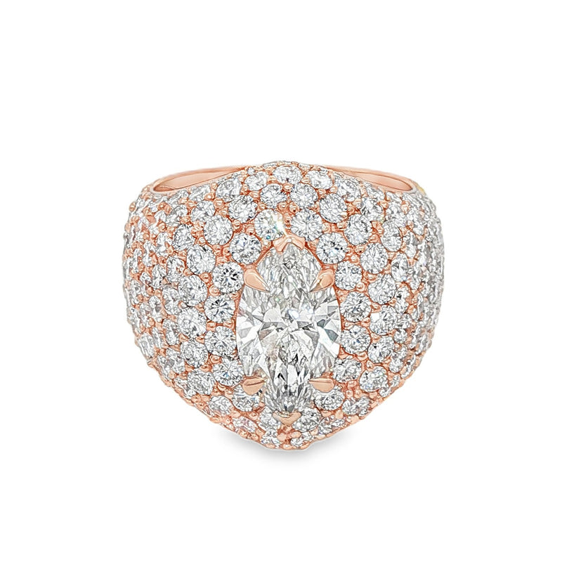 14K gold ring featuring marquise-cut center diamond
