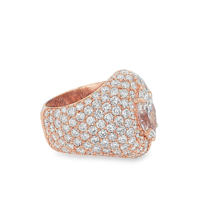 14K gold ring featuring marquise-cut center diamond