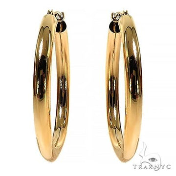 Women's 14K gold hoop earrings in yellow gold – circular profile, polished finish, front-facing view