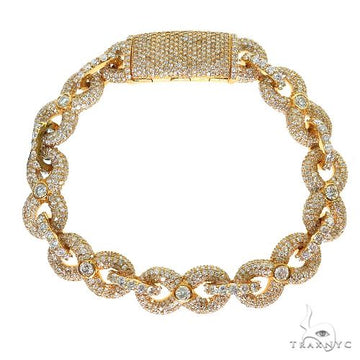 Men's infinity diamond bracelet in yellow gold – infinity symbol links set with diamonds, top-down view