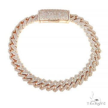 Two row prong set diamond Cuban bracelet in gold – double row of prong-set diamonds across Cuban links, top angle