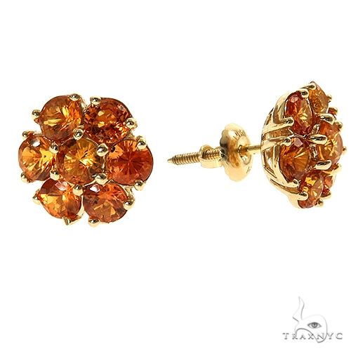 Cluster sapphire flower stud earrings in vibrant sunset orange with gold prongs