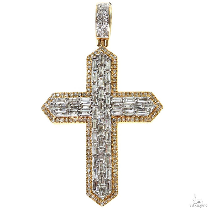 Yellow gold cross pendant with baguette-cut diamonds and a diamond-studded bail