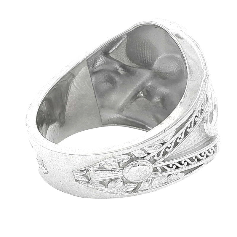 Silver skull ring with all-seeing eye pyramid and geometric details, matte finish.