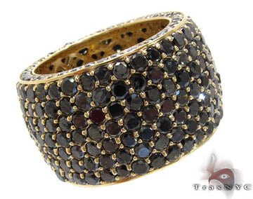Wide men's ring with seven rows of round black diamonds on a yellow gold band
