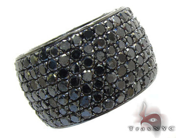 Wide men's ring with seven rows of tightly set round black diamonds