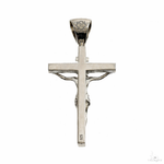 Small silver crucifix pendant with detailed Jesus figure and polished finish.