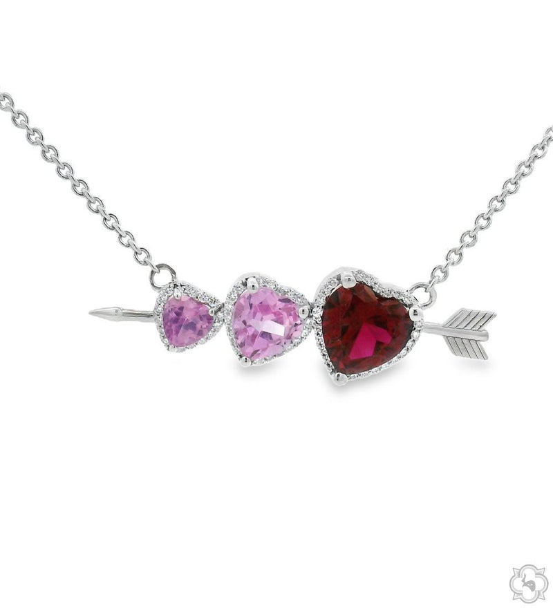 Triple heart arrow pendant set in sterling silver – front view showing three linked hearts with arrow motif