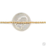 14K solid gold 2.5mm Franco chain with tightly woven flat links next to a dime for scale.