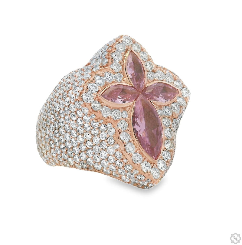 Rose gold ring with pink quartz cross and surrounding diamonds on wide band