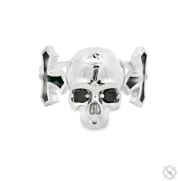 Silver skull ring with cross accents and black eye details, bold men's statement jewelry.
