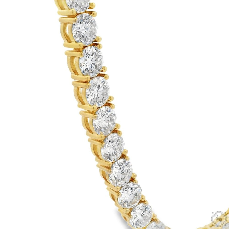 22-inch yellow gold tennis chain with round-cut 80 pointer diamonds.