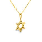 Yellow gold Star of David pendant necklace adorned with small diamonds on a delicate chain.