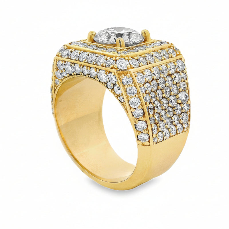 Yellow gold men's ring with large center diamond and multiple surrounding diamonds.