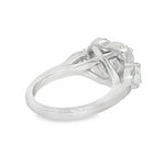 White gold heart-shaped halo three-stone diamond engagement ring, elegant design.