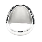925 silver ring with elephant design, black enamel accents, small black diamond detail.