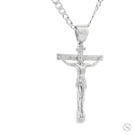 Silver crucifix pendant depicting Jesus on a Cuban curb chain necklace.
