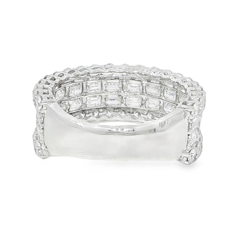 Silver band ring with three rows of rectangular baguette diamonds in a cluster design.