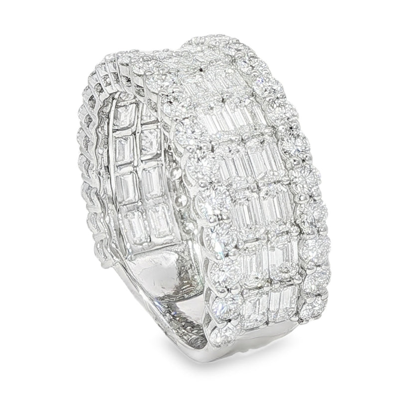 Wide white gold band ring with baguette and round diamond cluster detailing.
