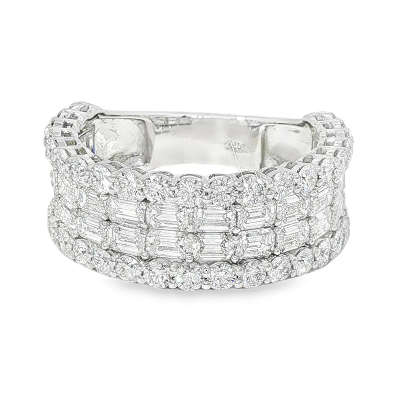 Wide diamond baguette cluster band ring in polished white gold with round diamond accents.