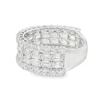 Silver ring with baguette diamond cluster design and round diamond accents.