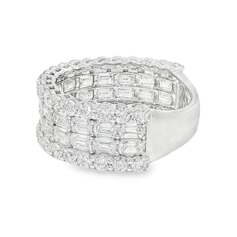 Silver ring with baguette diamond cluster design and round diamond accents.
