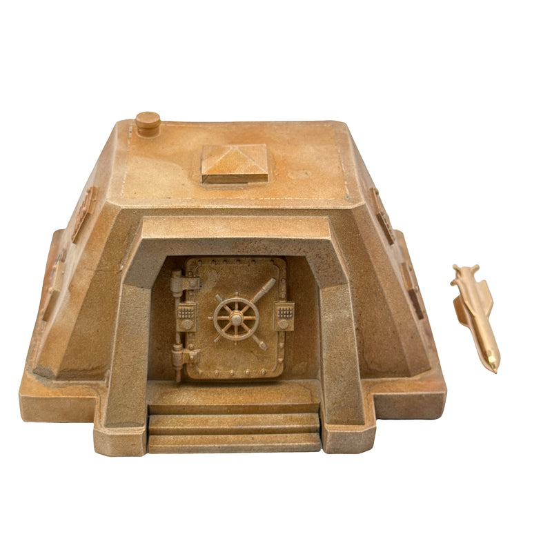 Gold bunker-shaped vault with detailed door and small gold missile accessory.